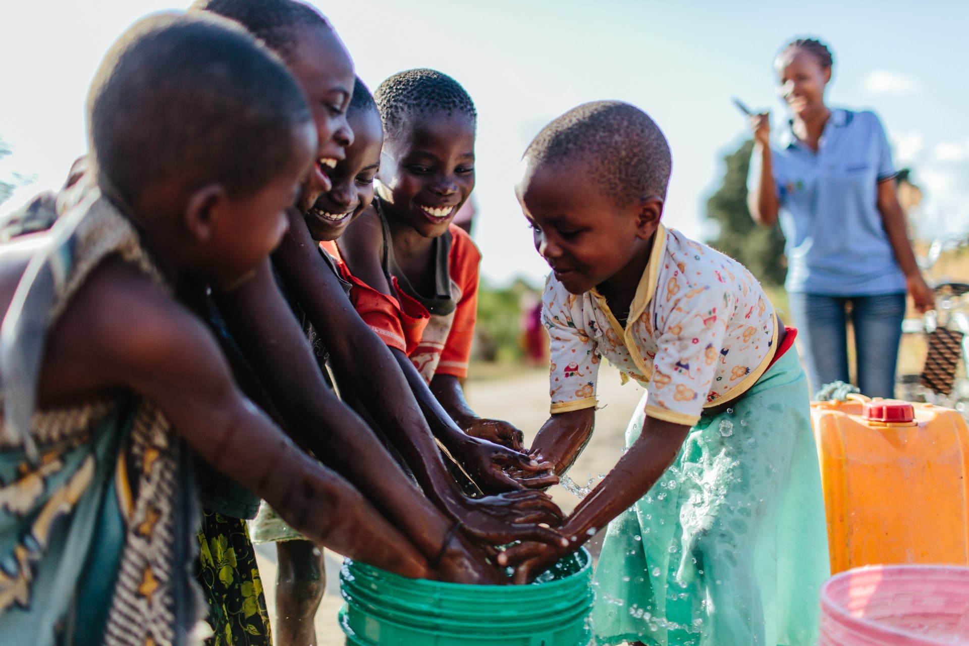 Children with clean water, Tanzania.jpg